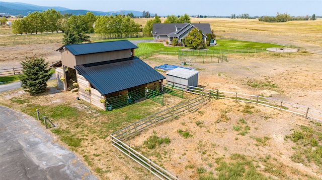 aerial view with a mountain view and a rural view