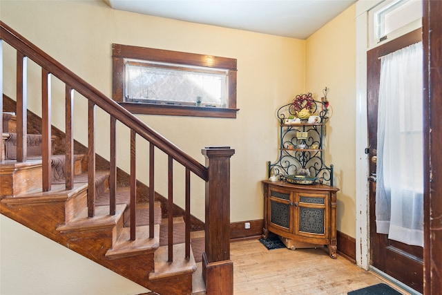 entryway with light hardwood / wood-style flooring