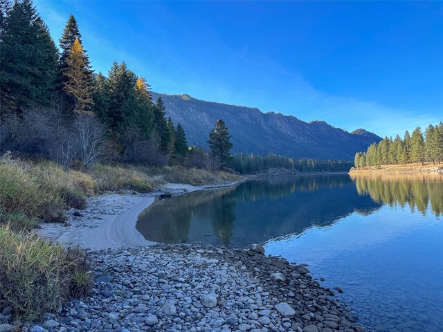 4895 Mt Highway 200, Thompson Falls, MT 59873 - water view featuring a forest and a mountain backdrop