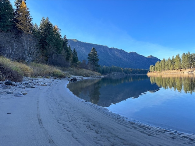 4895 Mt Highway 200, Thompson Falls, MT 59873 - water view featuring a forest and a mountain backdrop