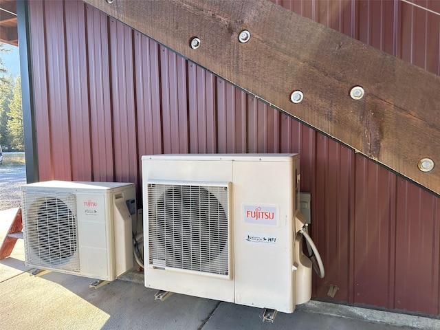 4895 Mt Highway 200, Thompson Falls, MT 59873 - exterior view of a cooling unit and board and batten siding