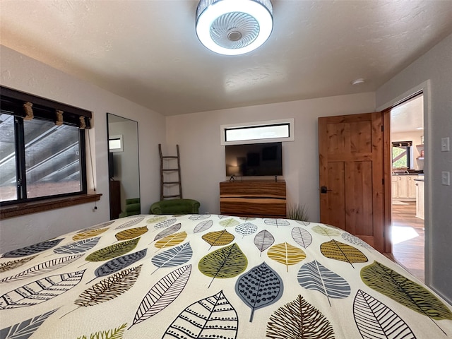 bedroom featuring hardwood / wood-style flooring