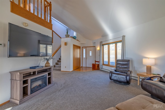 carpeted living room featuring a baseboard heating unit and high vaulted ceiling