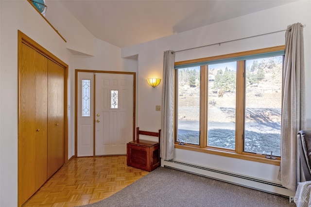 entryway featuring light parquet floors and baseboard heating