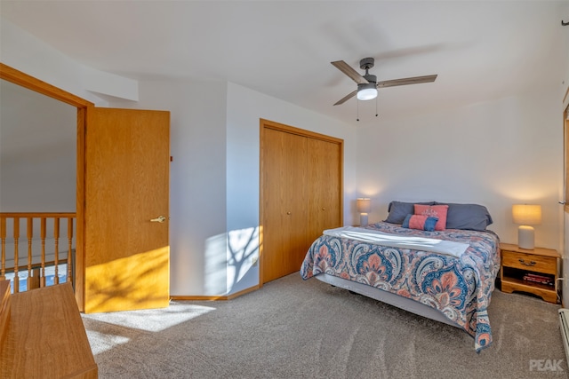 bedroom with carpet flooring, ceiling fan, and a closet