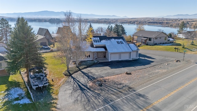 aerial view with a water and mountain view