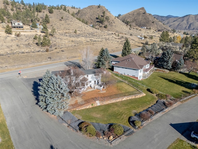 birds eye view of property featuring a mountain view