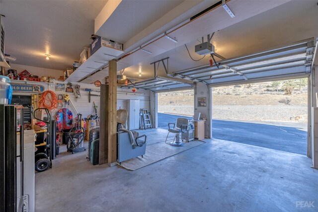 garage featuring a garage door opener