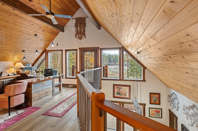 office area featuring high vaulted ceiling, wooden ceiling, wood finished floors, and beam ceiling