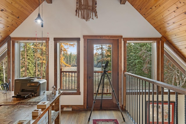 interior space featuring light wood-type flooring, wooden ceiling, high vaulted ceiling, and beam ceiling