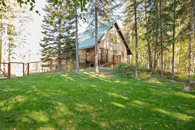 view of yard featuring fence