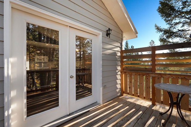 wooden terrace featuring french doors