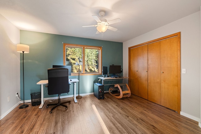 office featuring hardwood / wood-style flooring and ceiling fan