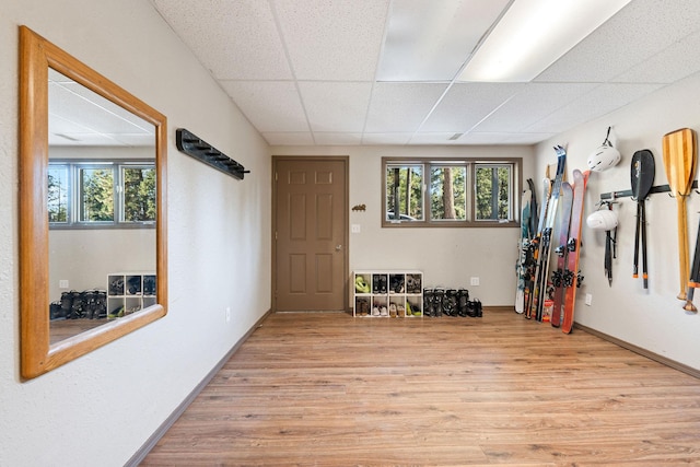 128 Ledgewood Dr, Bigfork, MT 59911 - entryway featuring a paneled ceiling and wood finished floors
