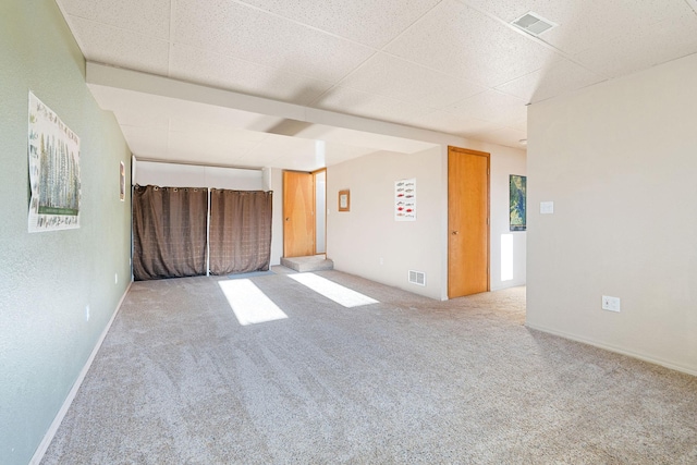 128 Ledgewood Dr, Bigfork, MT 59911 - empty room with carpet floors and a paneled ceiling