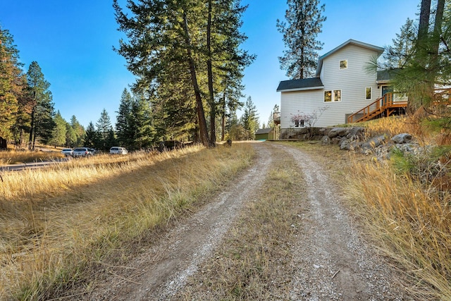 128 Ledgewood Dr, Bigfork, MT 59911 - view of dirt / gravel driveway