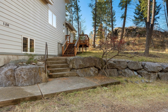 128 Ledgewood Dr, Bigfork, MT 59911 - view of yard with stairway and a wooden deck