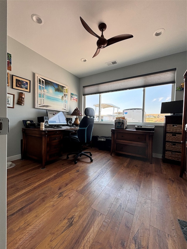 living room with wood walls and hardwood / wood-style flooring