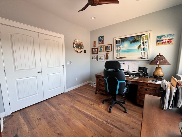 home office with hardwood / wood-style flooring and ceiling fan