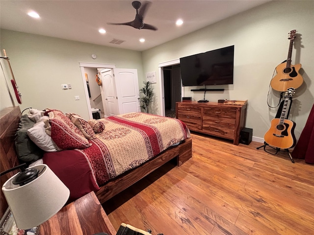 bedroom featuring ceiling fan and light wood-type flooring