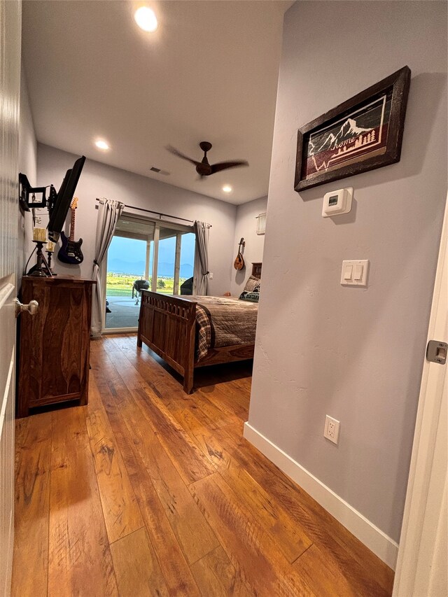 bathroom with wood walls