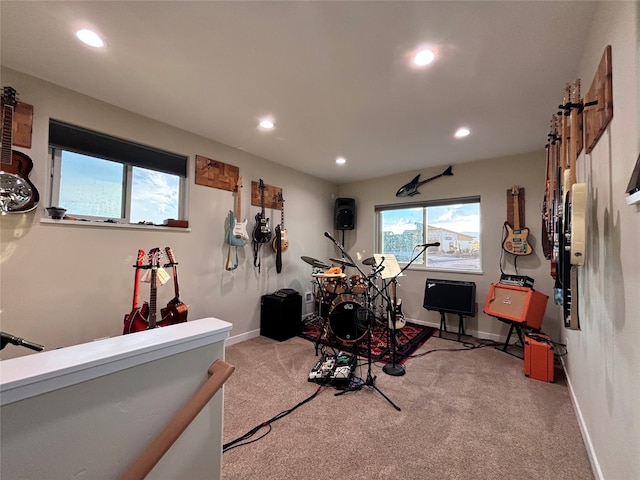 workout area featuring light colored carpet