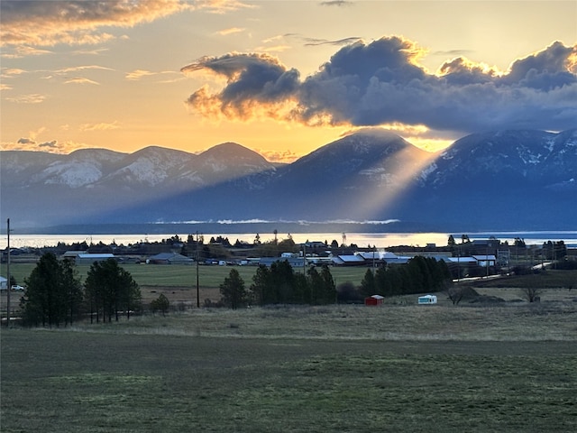 view of mountain feature with a water view