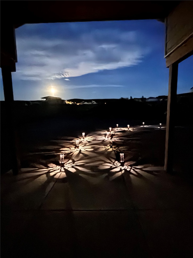 view of patio terrace at dusk