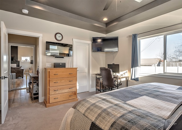 bedroom featuring hardwood / wood-style floors and ceiling fan