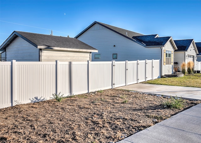 view of side of property with a garage