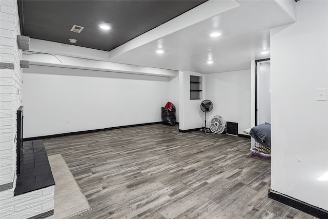 workout room with hardwood / wood-style flooring