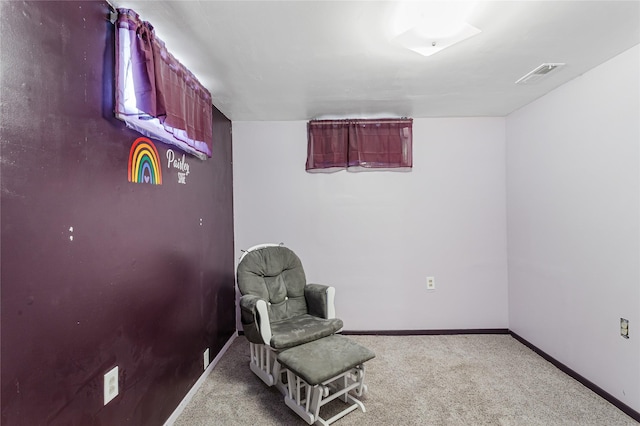 sitting room featuring carpet, visible vents, and baseboards