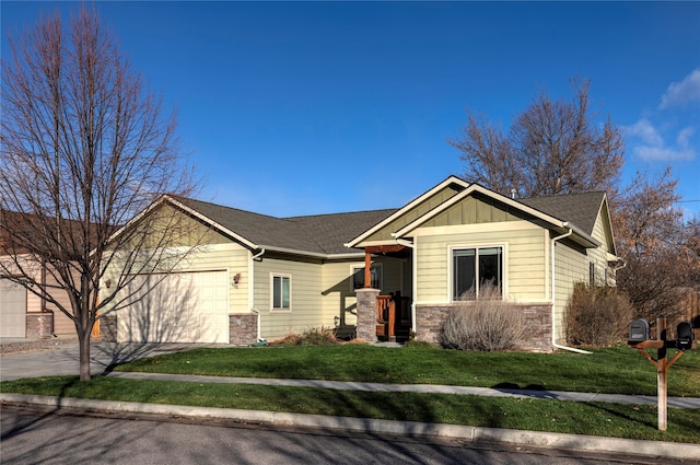 view of front facade with a front lawn and a garage