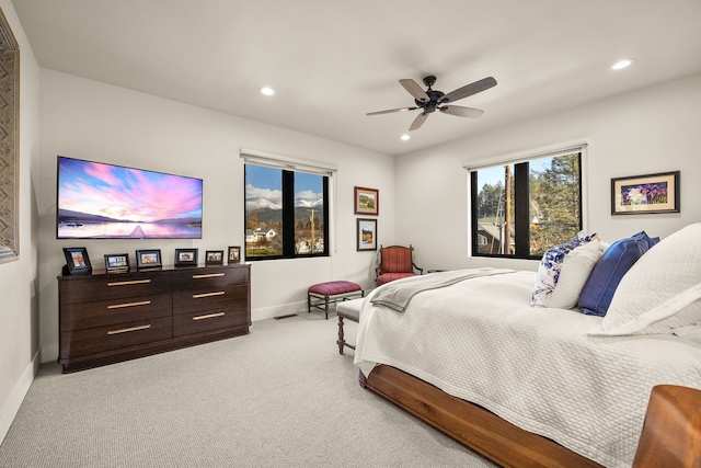 carpeted bedroom featuring ceiling fan