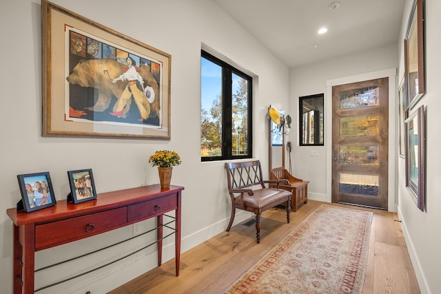 living area with light hardwood / wood-style floors