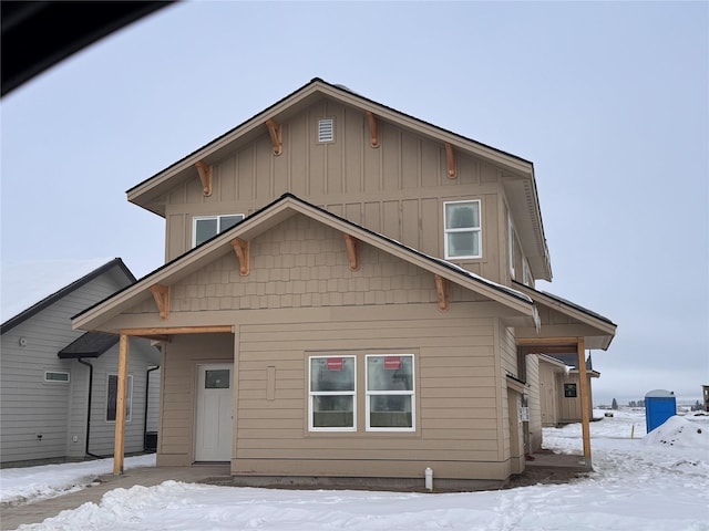 view of snow covered property