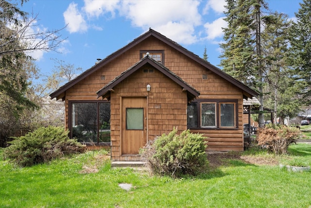 1312 2nd Ave E, Kalispell, MT 59901 - chalet / cabin featuring a front yard
