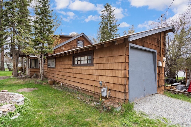 1312 2nd Ave E, Kalispell, MT 59901 - view of home's exterior with a lawn