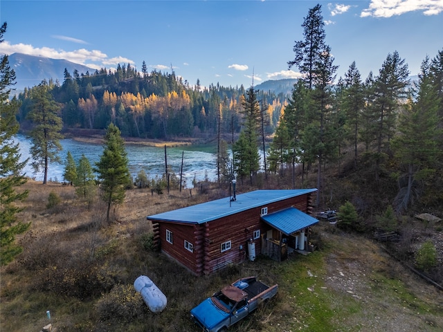 bird's eye view featuring a water and mountain view