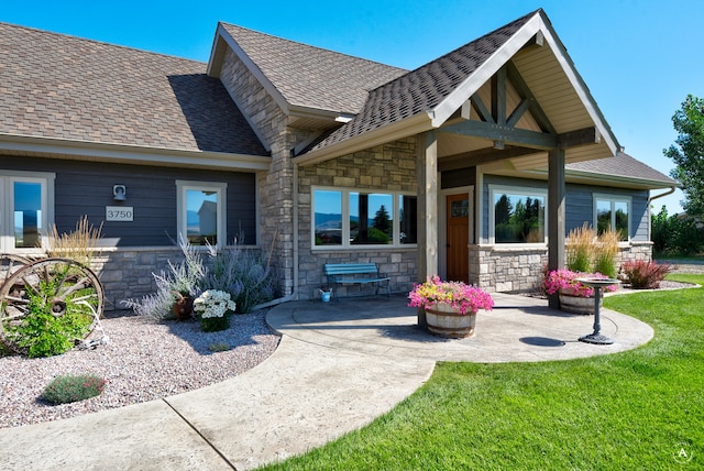 rear view of property with a patio and a yard