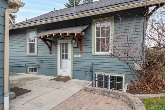 rear view of property featuring a patio