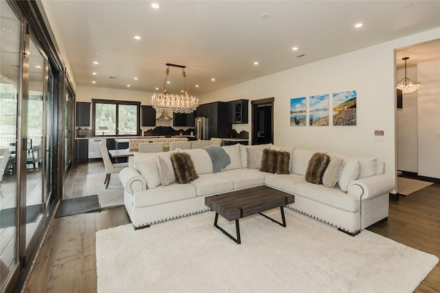 3868 Gelande St Unit 4, Whitefish, MT 59937 - living room with dark wood-type flooring, a chandelier, and recessed lighting