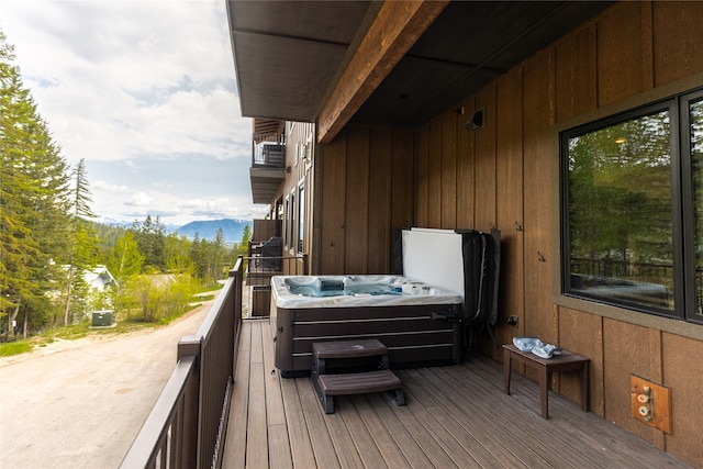 3868 Gelande St Unit 4, Whitefish, MT 59937 - deck with a mountain view and a hot tub