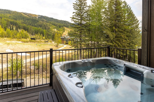 3868 Gelande St Unit 4, Whitefish, MT 59937 - wooden terrace with a forest view