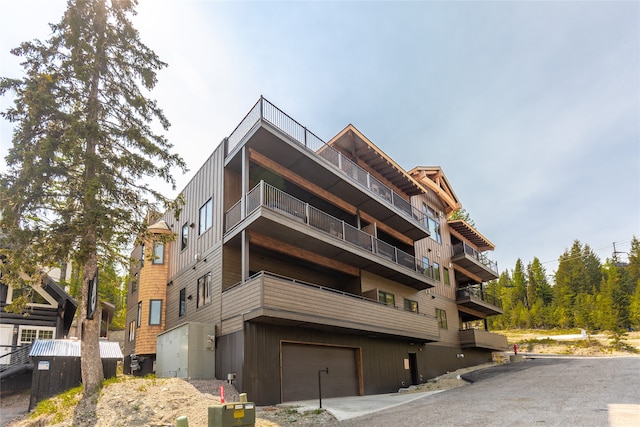 3868 Gelande St Unit 4, Whitefish, MT 59937 - view of building exterior featuring an attached garage