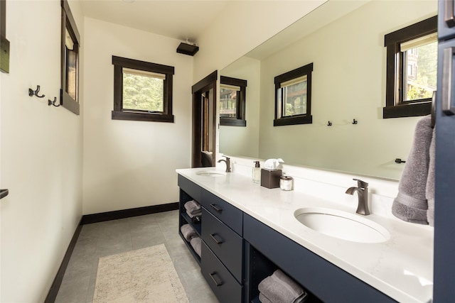3868 Gelande St Unit 4, Whitefish, MT 59937 - full bath with double vanity, baseboards, a sink, and tile patterned flooring