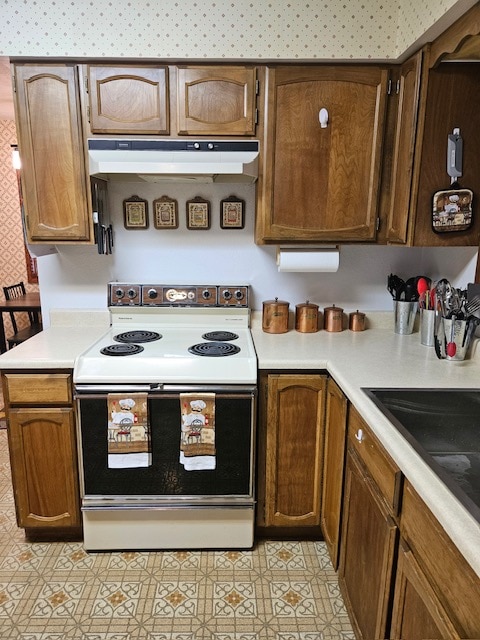 kitchen with white electric range oven