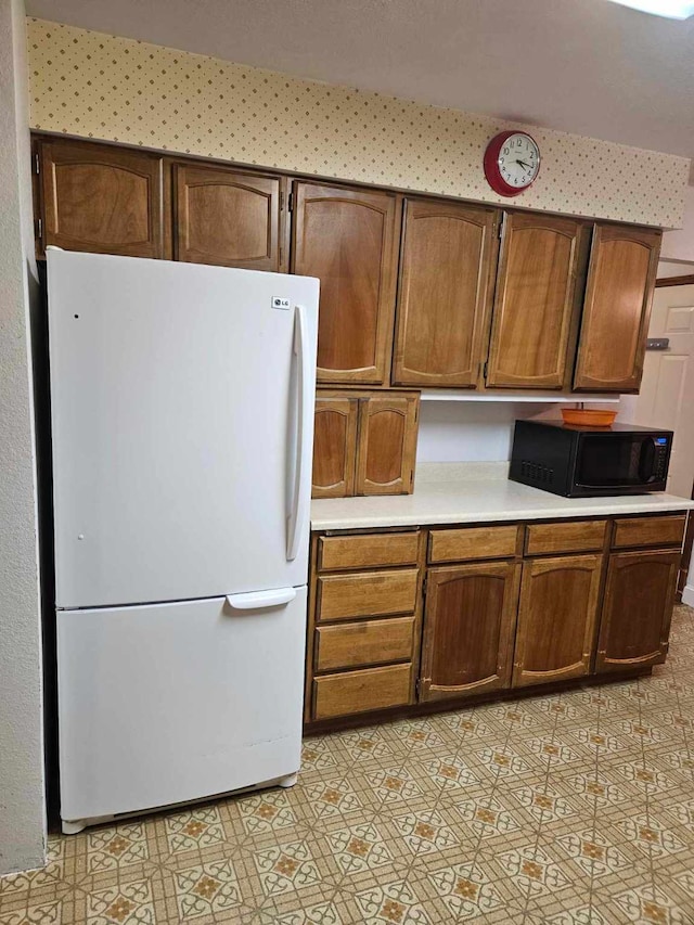 kitchen with white refrigerator