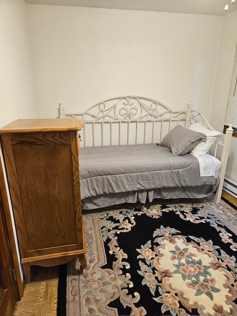 bedroom featuring wood-type flooring