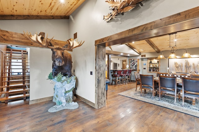 16485 Folsom Rd, Florence, MT 59833 - dining space featuring wood ceiling, wood finished floors, and baseboards